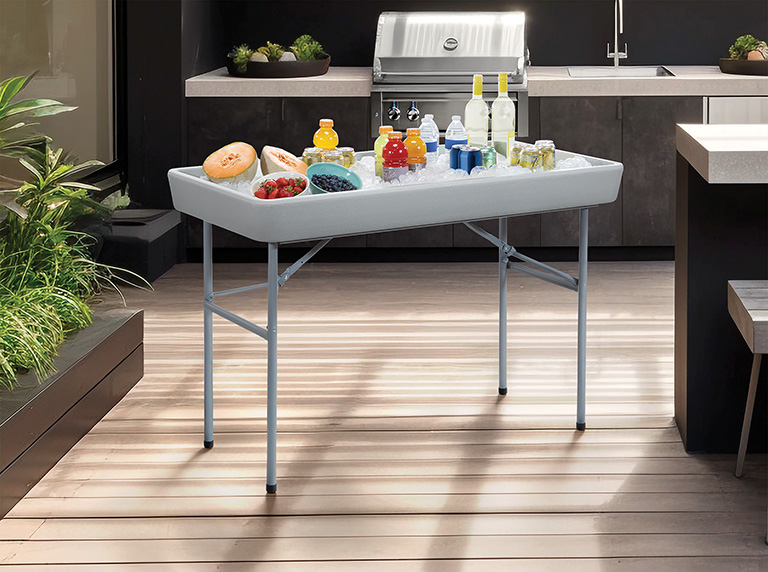 outdoor patio entertainment area with a built - in barbecue and